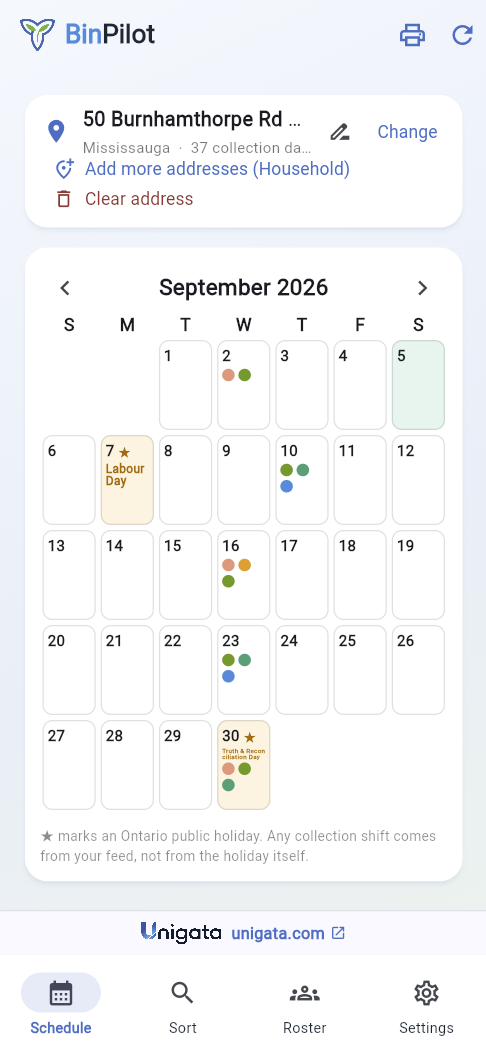 A September calendar with coloured dots marking collection days.