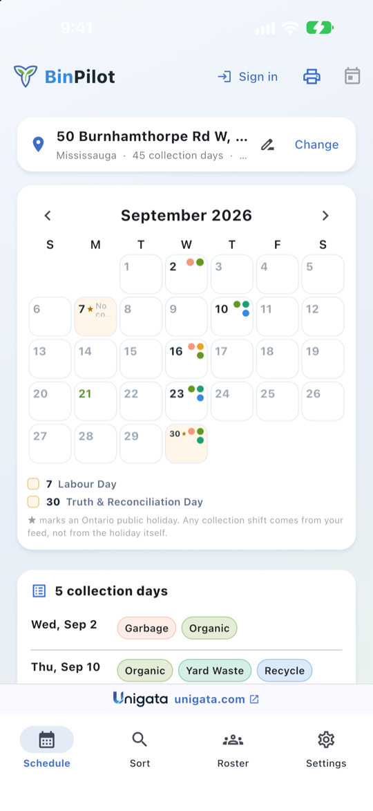 A September calendar with coloured dots marking collection days.